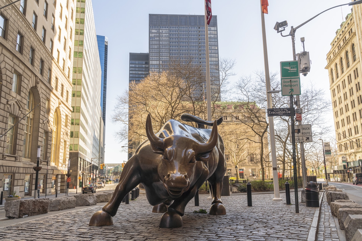 The iconic Charging Bull statue is not surrounded by the usual crowd because the city is deserted during the state of emergency triggered by the COVID-19 pandemic.